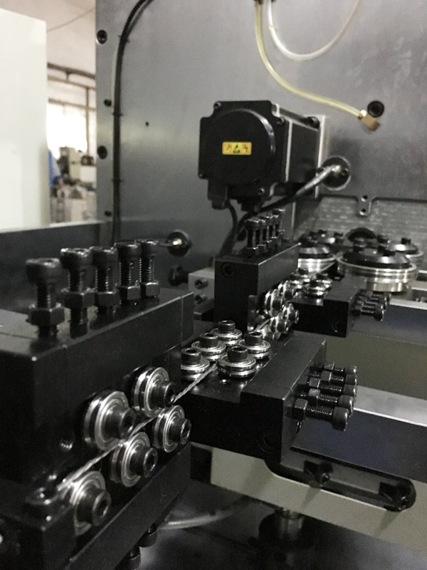 extension spring machine feeder